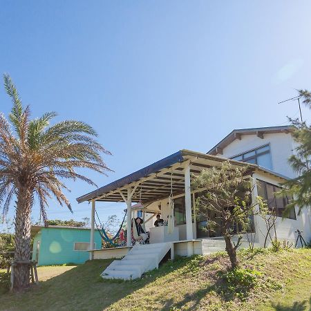 Kariyushi Condominium Resort Motobu The Beach Garden House Bagian luar foto